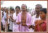 Udiya devotees sing with joy and offer their humble respects