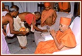 According to tradition, on behalf of the King the Brahmins do pujan of Thakorji and Swamishri