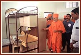 Swamishri sanctifies the rooms of the hostel
