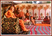 Swamishri engaged in correspondence