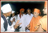 After the assembly Swamishri blesses the local cowherds