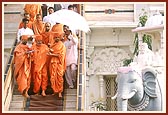 Swamishri descends from mandir steps after darshan
