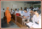 Swamishri sanctifies the computer lab that will teach girls 