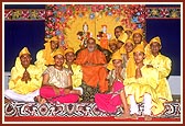 Kishores with Swamishri after a cultural dance performance