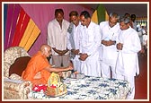 ... sanctifying brick for Bhadreshi village