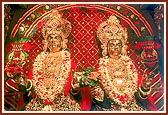 Beautifully adorned murtis of Shri Akshar Purushottam Maharaj
