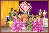 Balaks with Swamishri after performing a folk dance