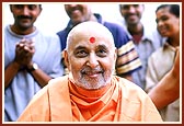 Swamishri in a jovial and responsive mood