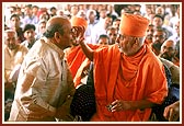 Swamishri applies a chandlo to Shri Balkrishnabhai Patel, who sponsored the entire mandir