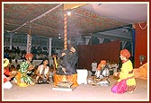 Youths of Gondal perform a drama to show the steadfastness of Abhaysinh Darbar and then receive Swamishri's blessings