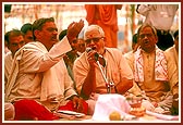 Brahmin pundits chant the vedic mantras during the yagna rituals