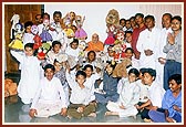 Bal karyakars perform a puppet show before Swamishri