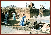 Devotees offer their services during the construction