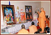 Swamishri performs the pratishtha rituals and arti of murtis for Bhandut