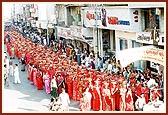 Women devotees chant the Swaminarayan mahamantra and reverentially carry 'mantra pothis' during the rally