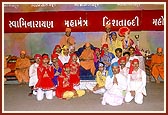 Youths who enacted the skits depicting the glory of the Swaminarayan mahamantra receive blessings from Swamishri