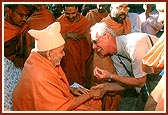 Swamishri greets and blesses Han Kop, a devotee from Holland 