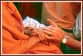 Swamishri greets and blesses Han Kop, a devotee from Holland
