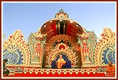 A view of the beautifully decorated stage, with Swamishri seated at the center