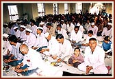 Devotees engaged in of murti sthapna ceremony, 1 Jan. 2002