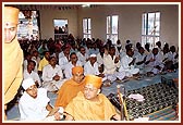 Devotees engaged in murti sthapna ceremony