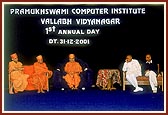 Swamishri on stage with senior sadhus and chief guests