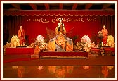 Swamishri on stage during the symbolic Jholi sabha
