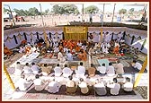 Devotees seated in the shilanyas ceremony in the foundation pit