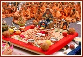 Shri Harikrishna Maharaj at the center of the mahapuja platform during the rituals
