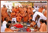 Swamishri and sadhus in a light mood during the shilanyas ceremony