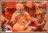 Swamishri and sadhus in a light mood during the shilanyas ceremony