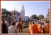 Swamishri blesses a devotee on horseback 