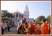 Swamishri blesses a devotee on horseback 