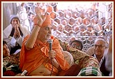 Swamishri blesses the devotees following the murti pratishtha ceremony