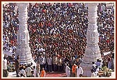 Thousands crowd around the main gateway for darshan of the newly consecrated murti of Shri Ghanshyam Maharaj