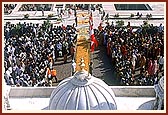 Thousands crowd around the main gateway for darshan of the newly consecrated murti of Shri Ghanshyam Maharaj