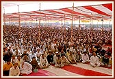 Devotees seated in the morning murti pratishtha assembly
