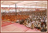 Devotees seated in the morning murti pratishtha assembly