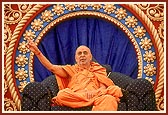 Swamishri blesses the devotees seated in the murti pratishtha assembly 