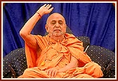 Swamishri blesses the devotees seated in the murti pratishtha assembly 