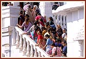 Devotees wait in queue for darshan of the newly inaugurated murti of Shri Ghanshyam Maharaj