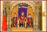 The murtis of Ichharambhai, Shriji Maharaj and Raghuvirji Maharaj in the mandir at Lakshmi Vadi