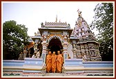 Descending the steps of the Lakshmi Vadi mandir