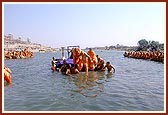 Swamishri about to enter the river for a holy dip