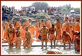 Sadhus bathing in the holy river