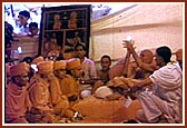 Yogiji Maharaj blesses the youths after the diksha ceremony