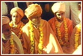 Front row (L to R) Pujya Yogiji Maharaj, Pujya Nirgundas Swami and Pujya Pramukh Swami Maharaj. Behind: Pujya Sanatan Swami