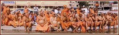 Senior sadhus seated on the banks of river Ghela