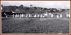 &nbsp;Devotees walk along the banks of river Ghela