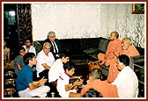 Swamishri with prominent local businessman Mr. Harilrela and the Dasvani family